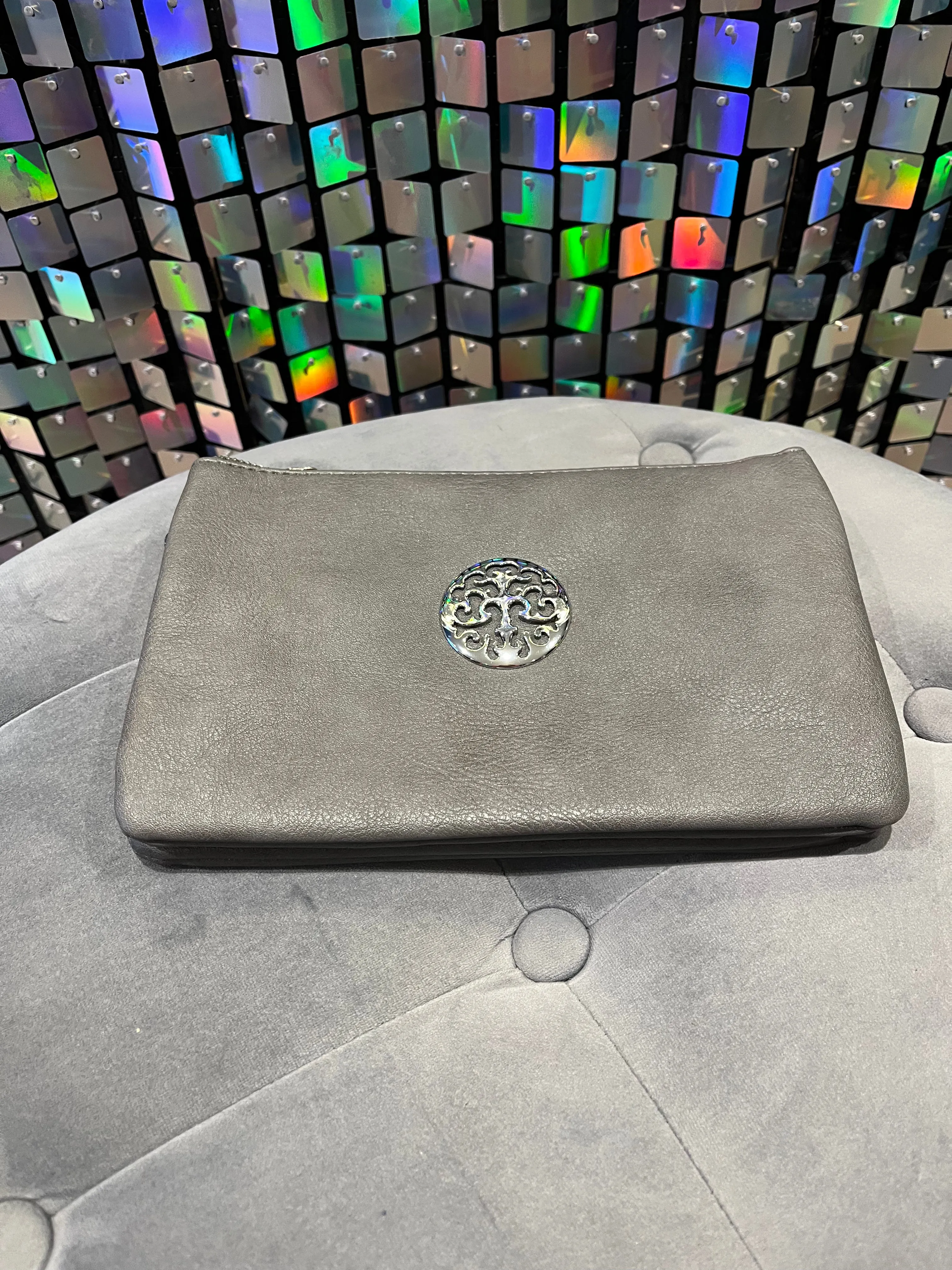 Clutch bag with cross body strap