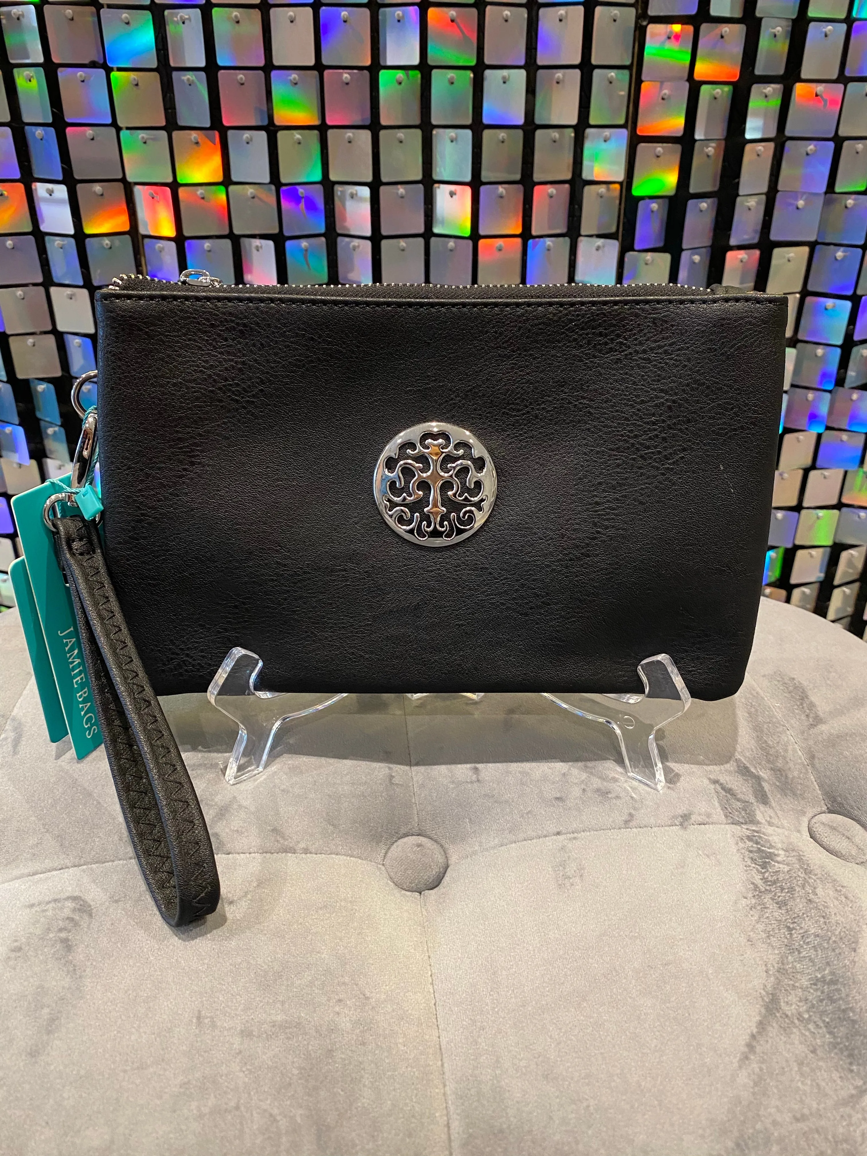 Clutch bag with cross body strap