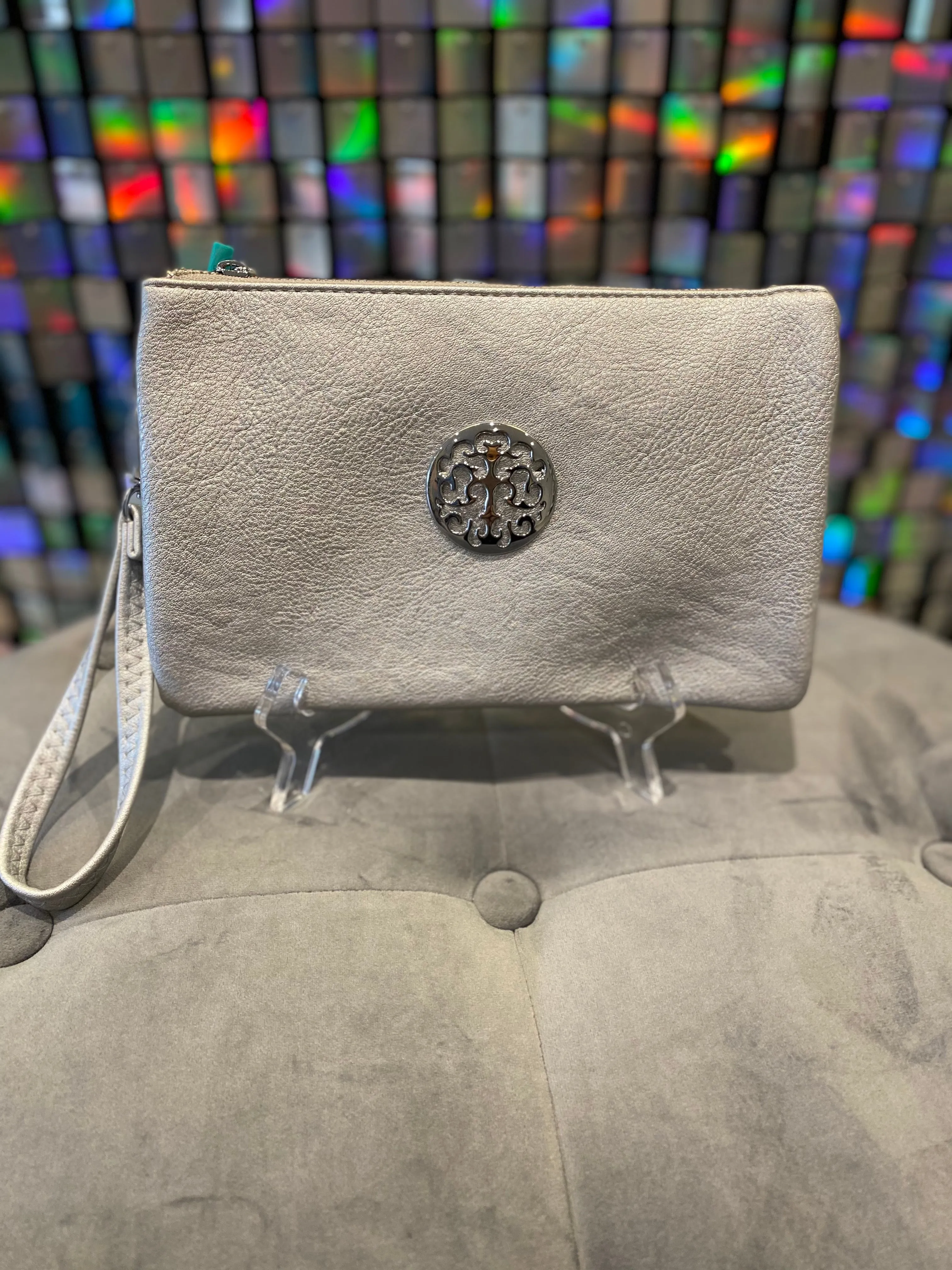 Clutch bag with cross body strap