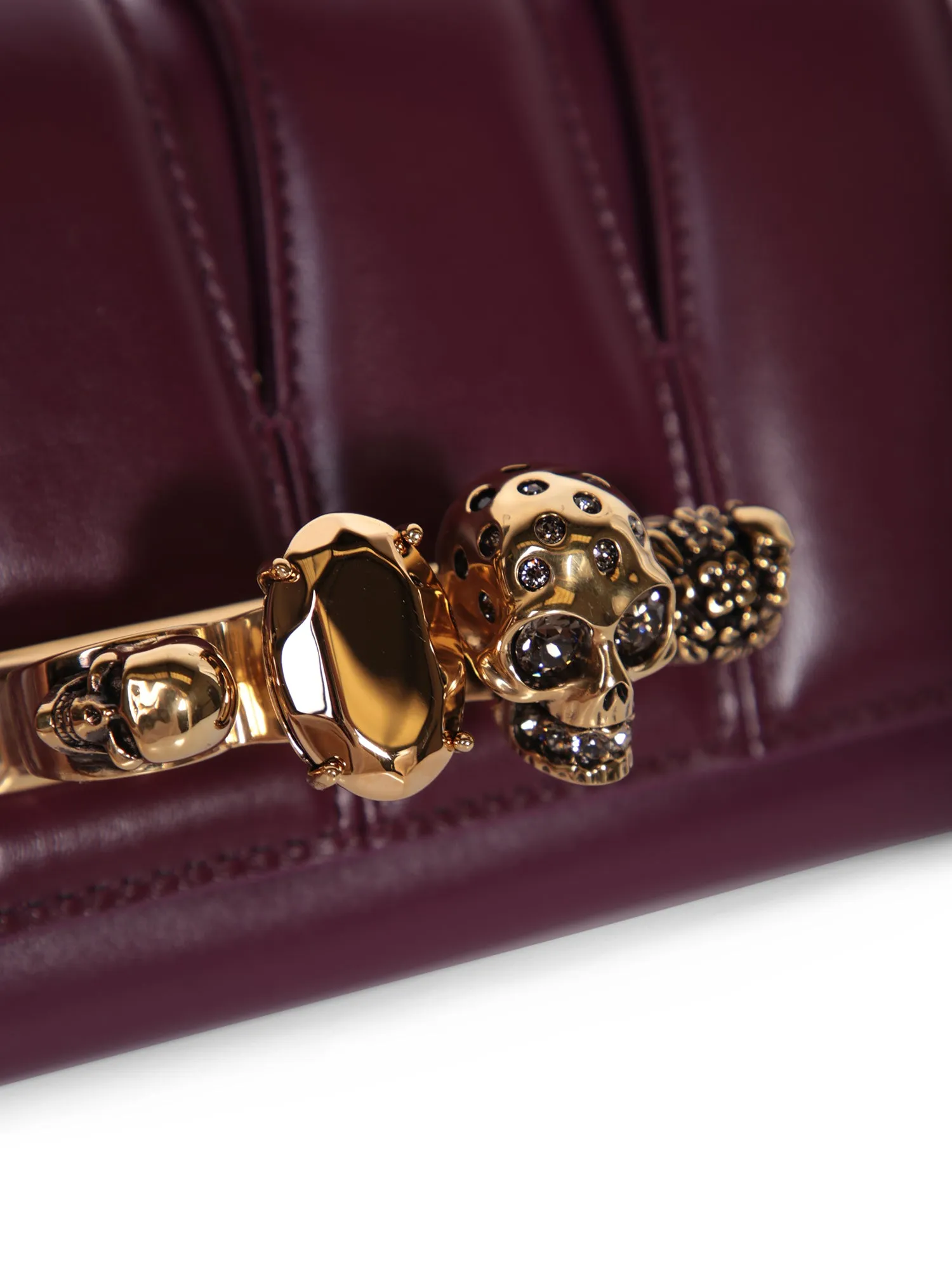 Four Ring clutch bag