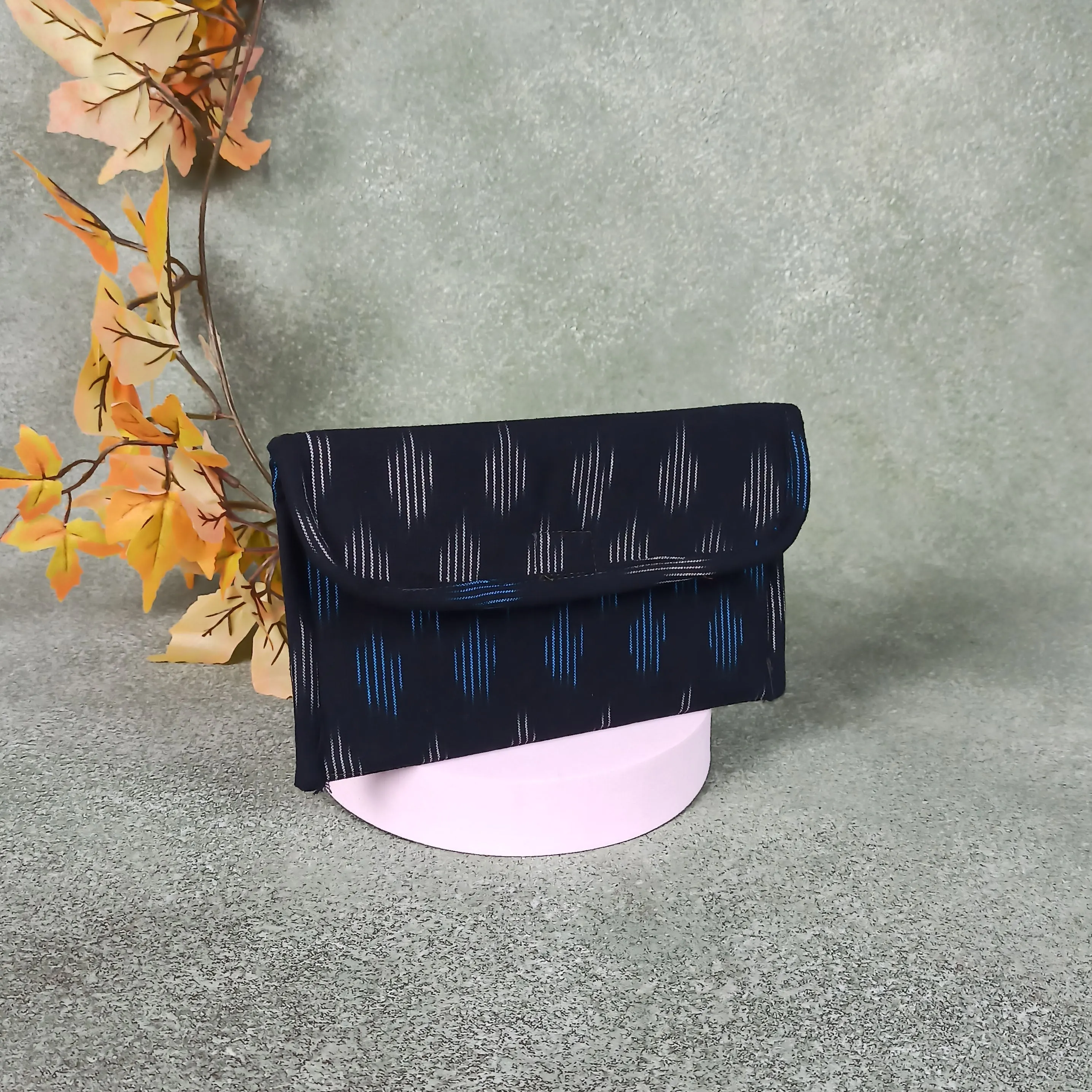 Ikat Clutch Black Colour with Blue Line Design.